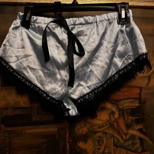 Blue, rose and flower multicolored silk shorts.